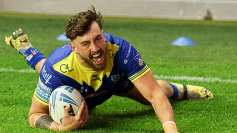 Matty Ashton scores a try for Warrington