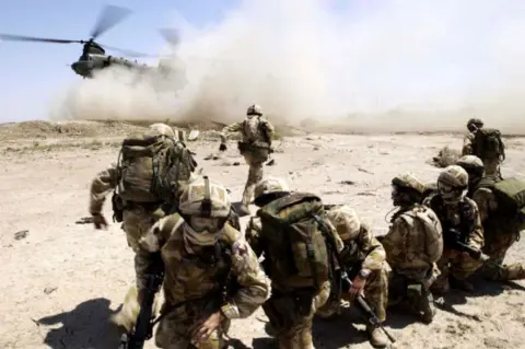 Getty Images Chinook and troops