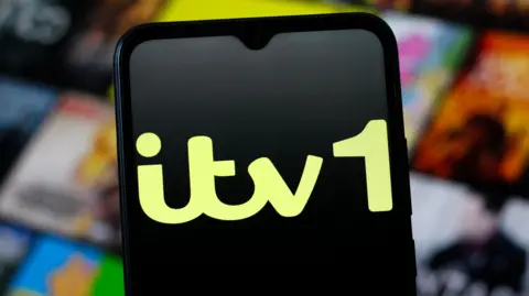 ITV1 logo shows on a phone screen