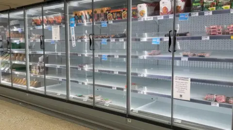 Few products in chilled cabinets.