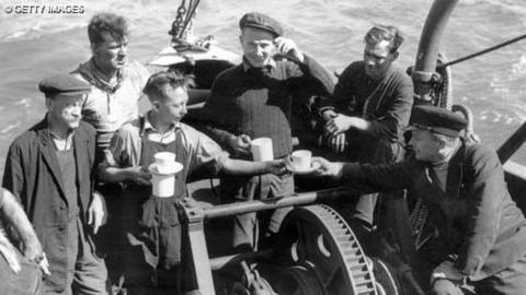 The crew of the London based tug 'Sunvill' one of the many small craft which took part in the evacuation of British and allied troops from Dunkirk.