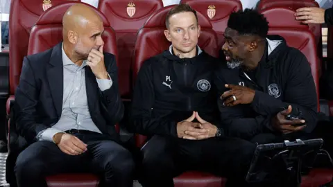 Coach of Manchester City Pep Guardiola, assistant-coaches Pepijn Lijnders and Kolo Toure during the UEFA Champions League 2025/26 League Phase MD2 football match between AS Monaco