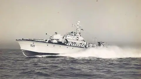 Coastal Forces Heritage Trust A black and white photo of one of the boats motoring at speed through the sea.