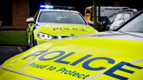 Northumbria Police Yellow Northumbria Police cars