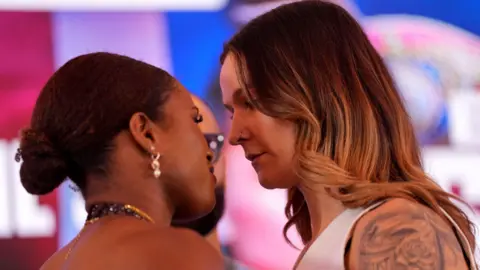 Caroline Dubois faces off with Terri Harper at a news conference