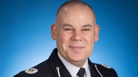 West Mercia Police An official photograph of Damian Barratt, new deputy chief constable of West Mercia Police, wearing his police uniform.