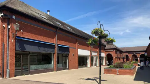 A view of empty shops in Crewe town centre