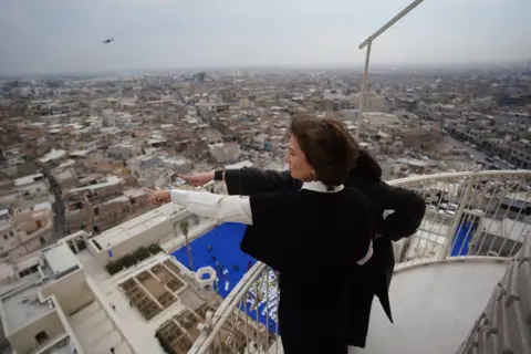 Unesco Unesco Director General Audrey Azoulay surveys the Old City of Mosul from the top of al-Hadba minaret