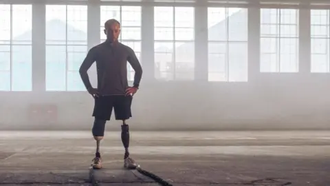 A man with two prosthetic legs. 