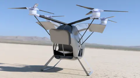 CraneAERO A machine which looks like a helicopter with four separate rotors grounded on an open desert