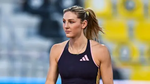 British pole vaulter Molly Caudery looks on during a competition