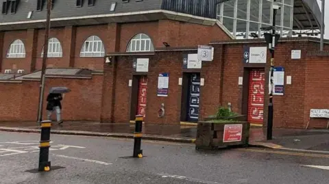 Harrison Galliven A road with bollards at the end blocking traffic 