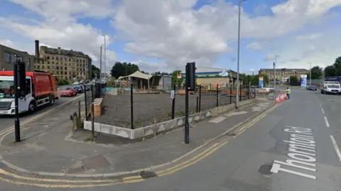 Google Street View image of the junction of Thornton Road and Listerhills Road, currently empty land. 