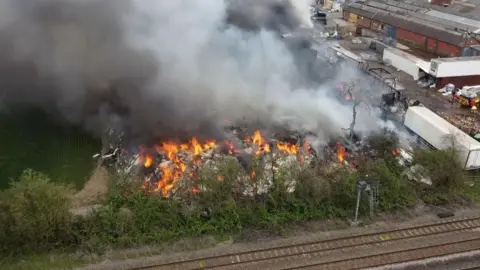 Smoke billowing into the sky