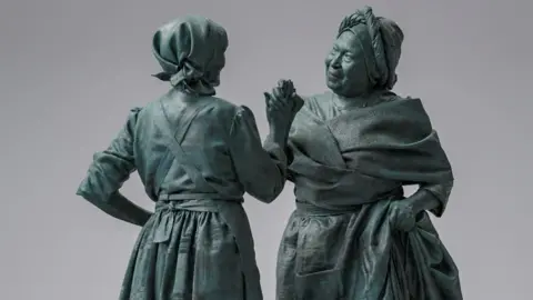 Rachel Carter Statue design showing two women from the 19th Century clasping hands as they greet each other