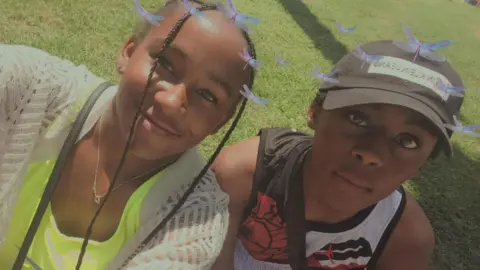 PA Media Ameiya (L) and Ricardo Parris (R) pictured in front of grass with a dragonfly filter over the top