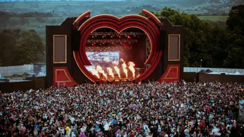 Alastair Brookes Thousands of festivalgoers in front of the main stage