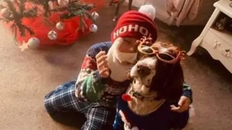 West Midlands Police Retired police dog Sam with new best friend Elliott