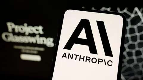 A phone screen with the Anthropic logo on it in black and white.