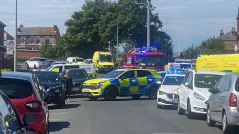 David Jack A police car blocks a busy road in Hart Street 