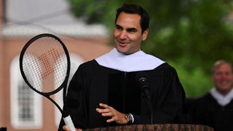 Roger Federer in a dark robe at Dartmouth College