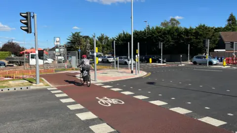 Jozef Hall/BBC Cyclops junction in Cambridge - with a cyclist using a lane