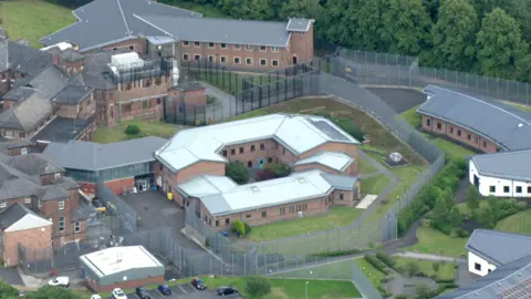 An aerial view of the Edenfield Centre, which comprises of a number of buildings surrounded by a metal fence