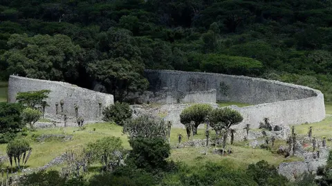 AFP via Getty Images A general views shows the massive stone walls of Great Zimbabwe