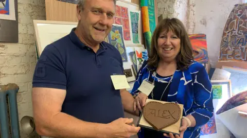 Manchester University NHS Foundation Trust Judy Coutinho (right) and partner Gary (left)