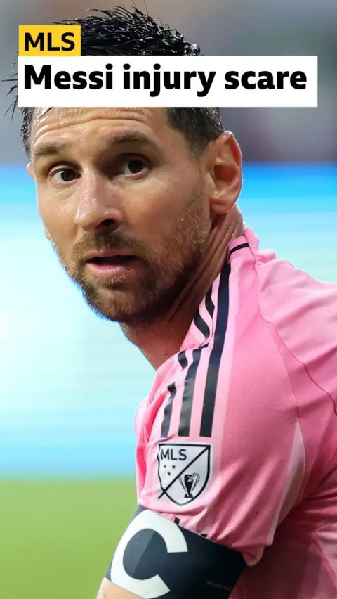 Lionel Messi close-up wearing pink Inter Milan shirt 