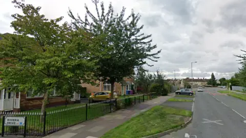 Street view of a Altcross Road junction meeting Riviera Drive.