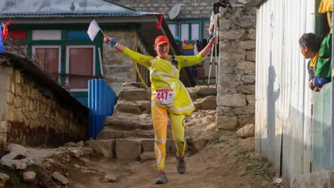  Rakesh Prajapati Sally Orange coming down Mount Everest