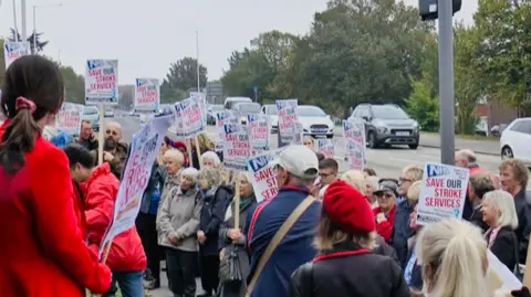 BBC South East Today Protesters outside the QEQM Hospital in Margate call for stroke services to be kept locally