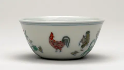 PA Media Small ceramic bowl with a chicken painted on the outside