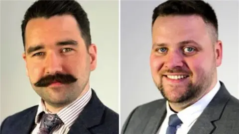Headshots of Councillor Scott Cameron and Councillor Luke Cooper. Councillor Cooper has a large black moustache and is wearing a dark suit jacket, white shirt and tie. Councillor Cameron has a thin beard and wears a blue tie, grey jacket and white shirt.