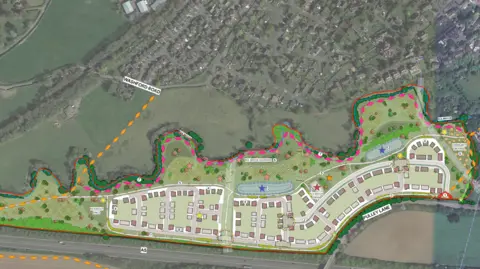 An aerial illustration of a proposed housing development with a red line around it. There are green spaces and trees illustrated