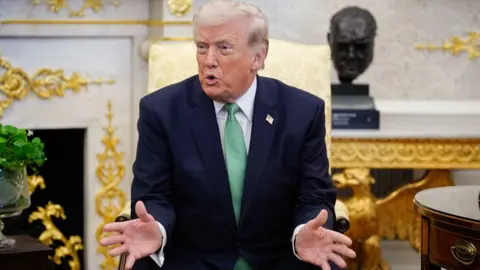 US President Donald Trump speaks in the Oval Office of the White House in Washington, DC, US, on Tuesday, March 17, 2026. 