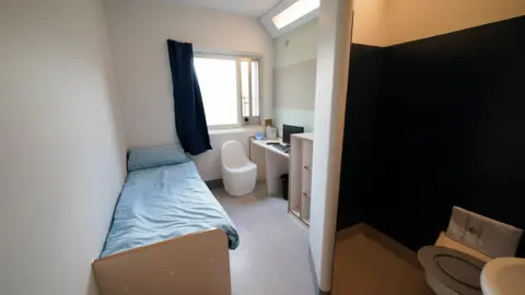 PA Media A prison cell during the official opening of HMP Fosse Way, the new Category C prison in Leicester