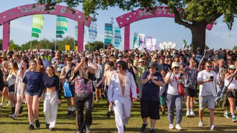 Isle of Wight Festival Crowd of festival-goers heading into the Isle of Wight festival.