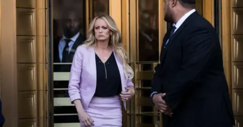 Getty Images Stormy Daniels leaves a courthouse in New York after giving evidence