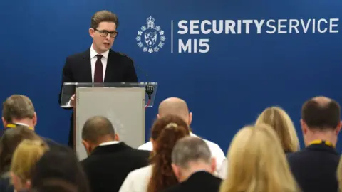 PA Media Director General of MI5 Sir Ken McCallum delivers the annual Director General's Speech at Thames House in front of an audience