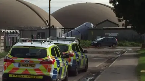 Police cars outside the BioDynamic food waste recycling centre in Colwick, Nottinghamshire on 20 September 2017.