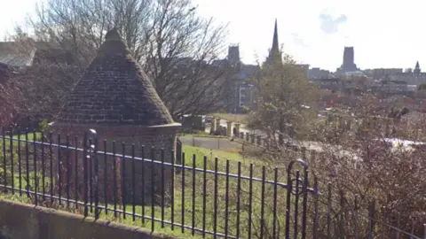 Google Everton lock up with the two city cathedrals in the distance