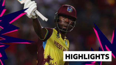 West Indies' Sherfane Rutherford raises his bat