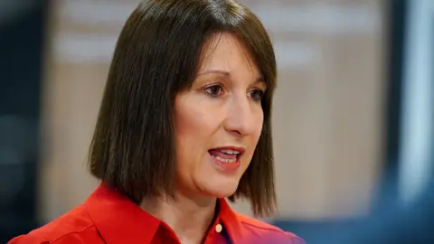 Rachel Reeves dressed in a red shirt