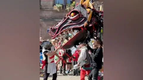 Knight and dragon meets in crowds in Chester