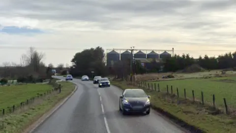 Four cars being driven along the countryside A950 near Mintlaw 