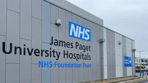 Andrew Turner/BBC The exterior of the James Paget Hospital in Norfolk. 