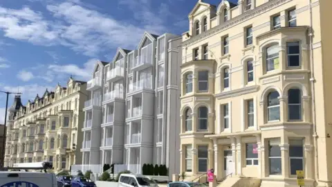 G8 ARCHITECTS An illustration of the development alongside a row of Victoria-era buildings with blue sky above.