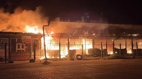 Buildings are on fire following Russian strikes on Ukraine's eastern Donetsk region. Photo: 17 August 2026